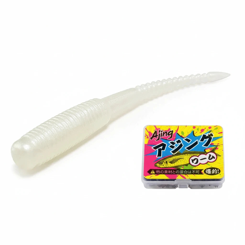 A translucent white ribbed soft plastic fishing lure shown on a white background. The product packaging box labeled 'Ajing' is visible in the lower right